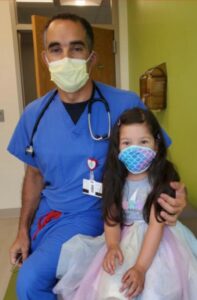 Dr. Cyrus Samai with Patient
